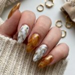 Add a Touch of Sparkle to Your Winter Nails with These Seasonal Trends