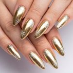 Add a Touch of Luxury with Gold Christmas Nails
