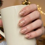 Unlock the Magic of Gold Christmas Nails: A Comprehensive Guide