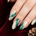 Elevate Your Holiday Look with Gold Christmas Nails