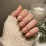 Sparkling Gold Christmas Nails: A Seasonal Nail Art Trend