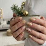 Shine This Holiday Season: A Guide to Gold Christmas Nails