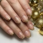 Shine Bright This Holiday Season: The Ultimate Guide to Gold Christmas Nails