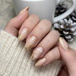 Shine Bright This Holiday Season: The Ultimate Guide to Gold Christmas Nails