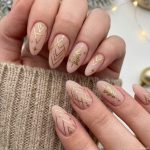 Sparkle This Holiday Season: The Ultimate Guide to Gold Christmas Nails